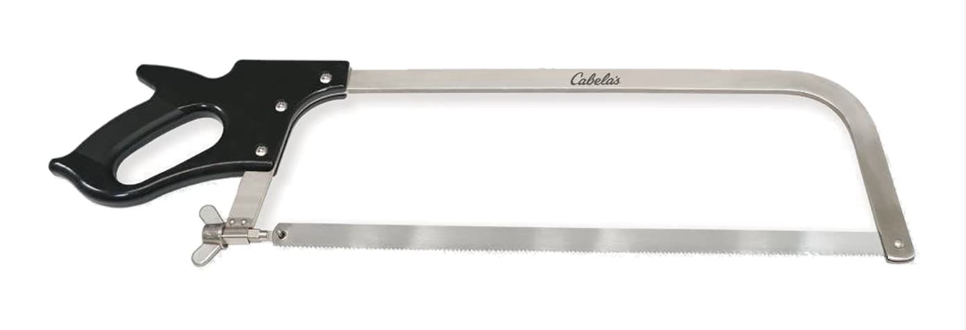A Cabela's butcher saw seen side-on: a black grip handle on the left, a stainless bow frame with the Cabela's script on top, and a toothed stainless blade along the bottom tensioned by a wing nut.