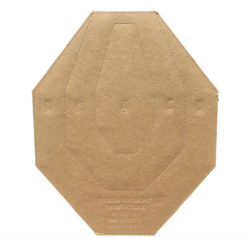 An official IPSC Classic cardboard target in tan, the headless octagonal silhouette with the A, C and D scoring zones perforated in and the CHL Targets license stamped along the bottom.