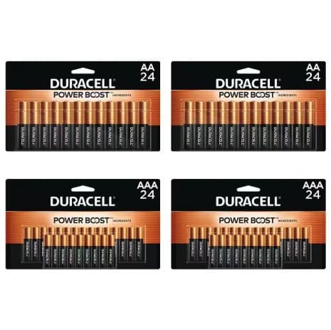 Four Duracell CopperTop 24-packs on white: two AA and two AAA.