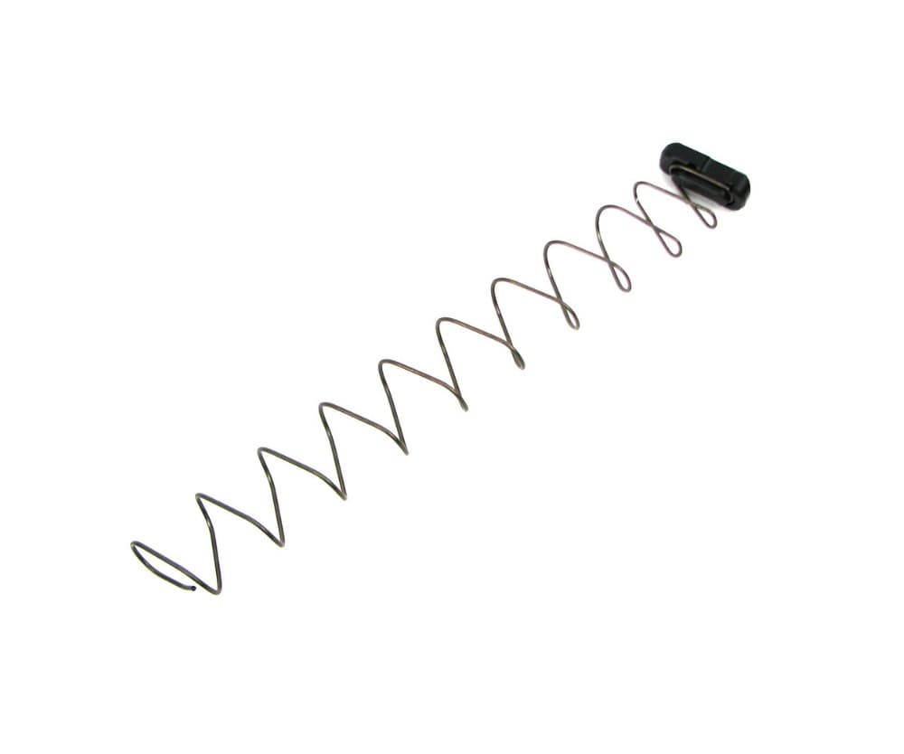 A Grams Engineering 11-coil magazine spring lying diagonally on white, the small black S2 follower clipped to its top end.