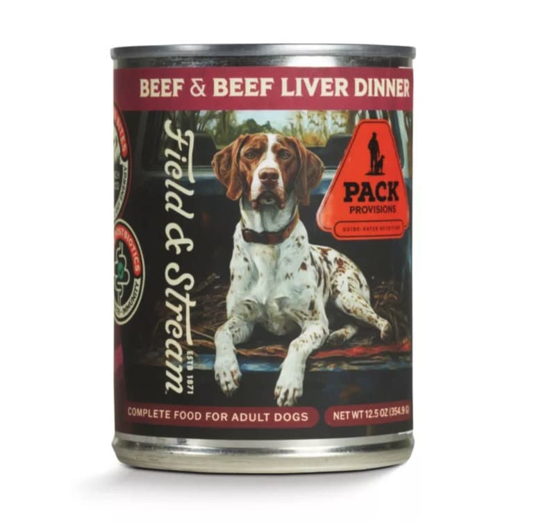A 12.5 oz can of Field & Stream Pack Provisions Beef & Beef Liver Dinner wet dog food, a German shorthaired pointer in a pickup bed on the label under a dark red band.