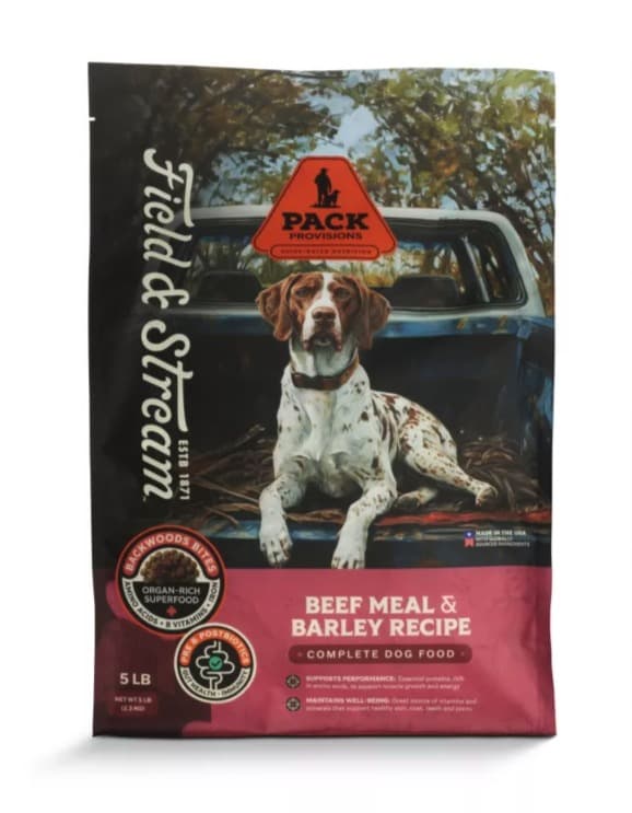 A 5 lb bag of Field & Stream Pack Provisions Beef Meal & Barley Recipe dog food, a German shorthaired pointer lying in the bed of a pickup on the front, the Field & Stream script down the left edge and a red band along the bottom.