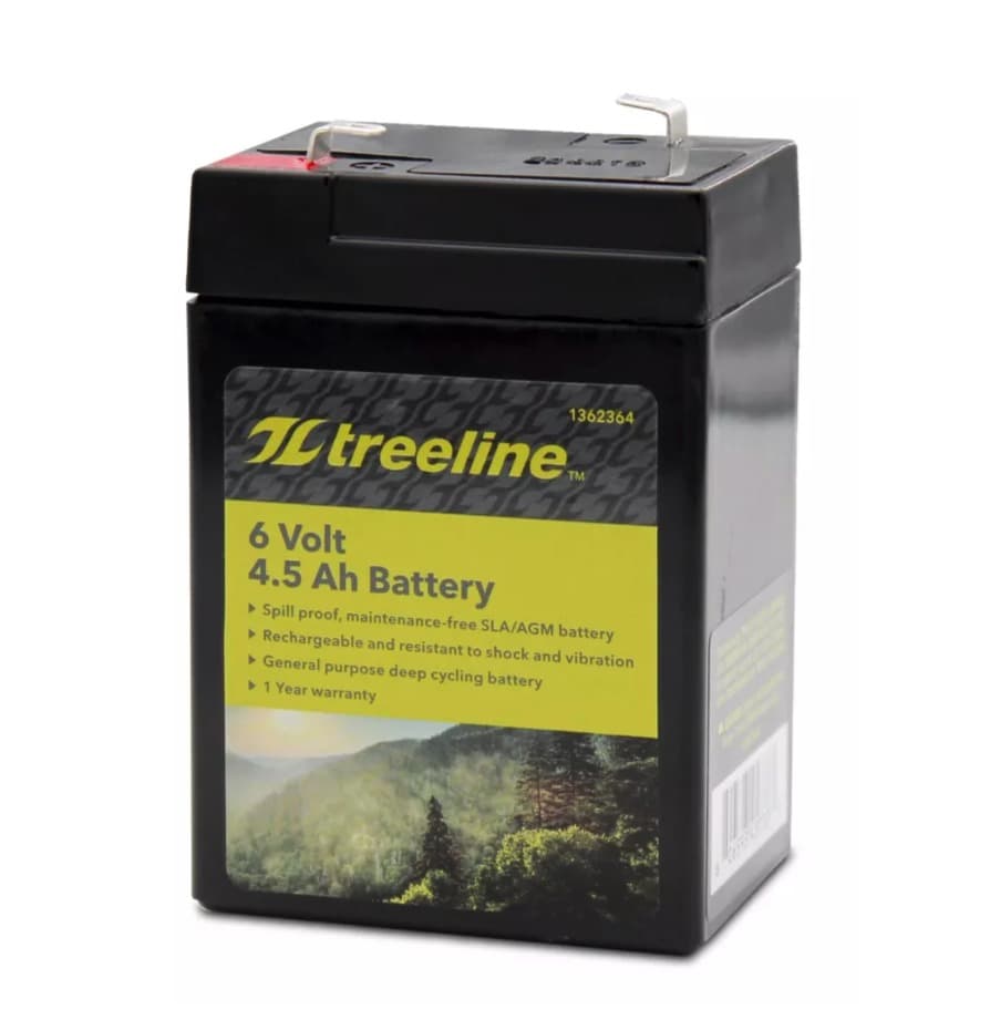 A treeline 6-volt 4.5 amp-hour AGM battery, a black rectangular sealed battery with two spade terminals on top and a yellow-and-green label with a forest scene.