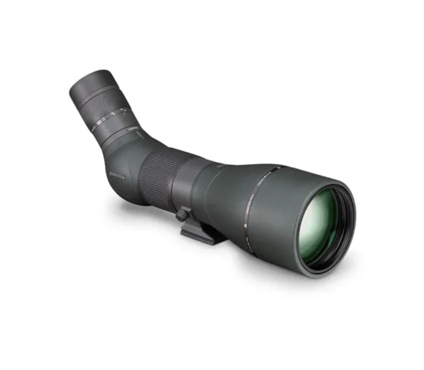 A dark green Vortex Razor HD 27-60x85 angled spotting scope lying diagonally on white, the big objective lens toward the camera at lower right and the angled eyepiece rising to the upper left, tripod foot underneath.
