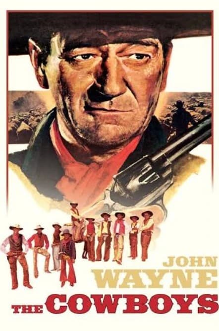 The Cowboys poster: John Wayne under his hat brim with a revolver, and his young trail crew lined up below.
